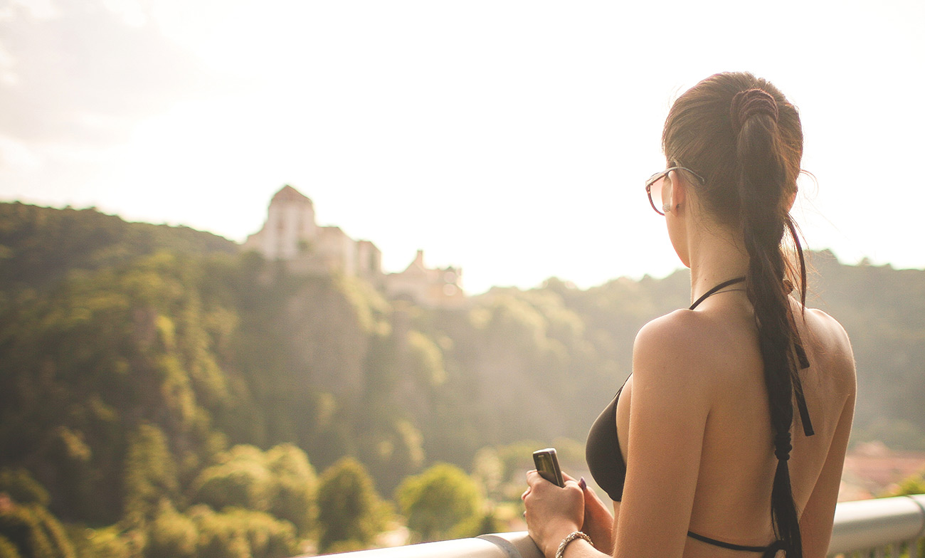 Image of a woman expressing the importance of taking time to reflect in nature away from brain games