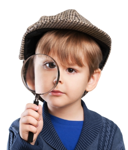 Image of young child dressed as Sherlock Holmes to express the problem with using brain games