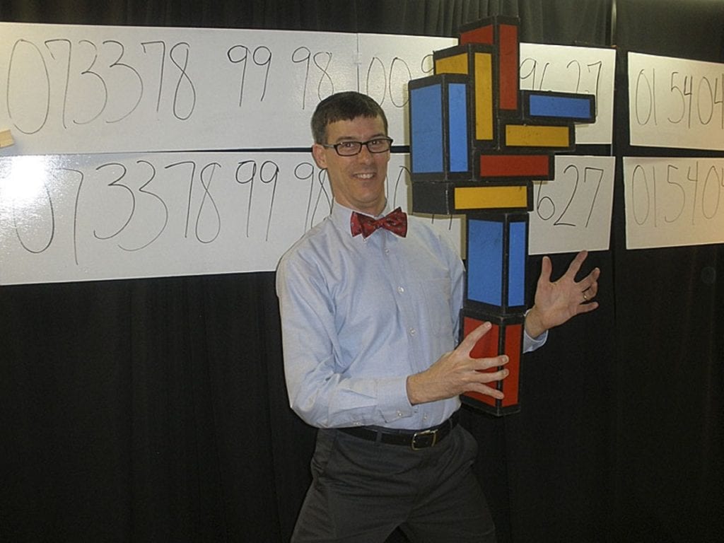 Brad Zupp teaching memory techniques at a school presentation