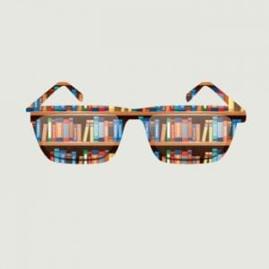 Sunglasses reflecting a scholarly bookshelf