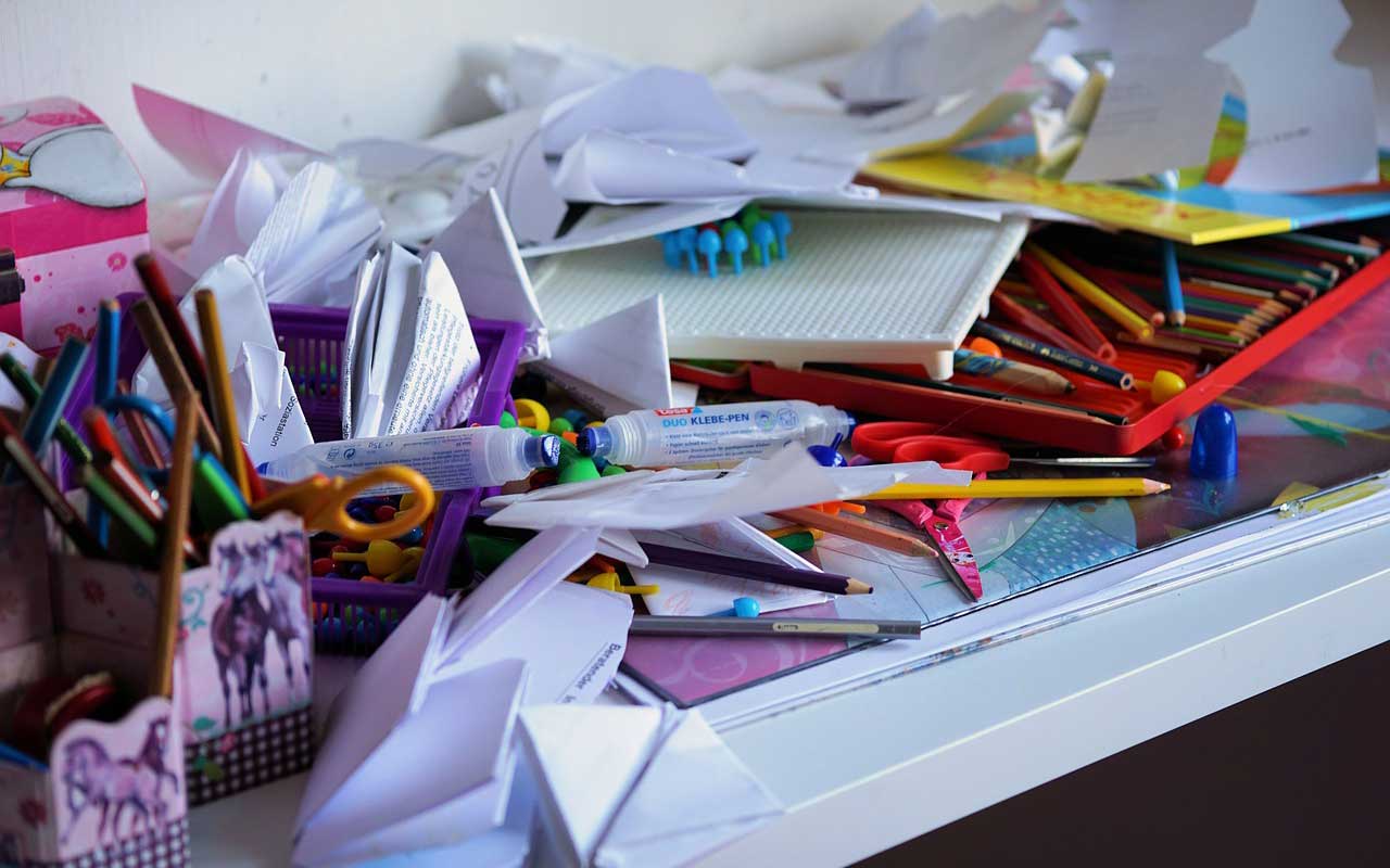 A very cluttered desk; the opposite of minimalism.