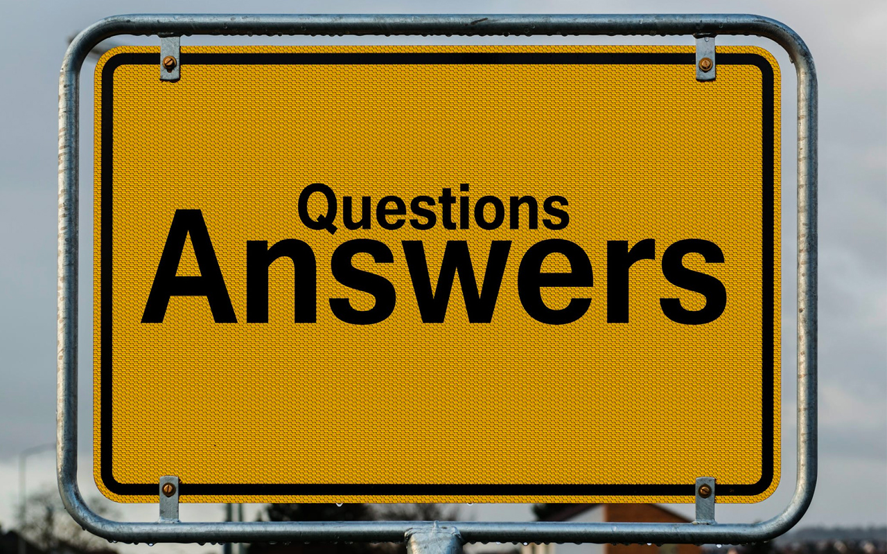traffic sign with the words questions and answers