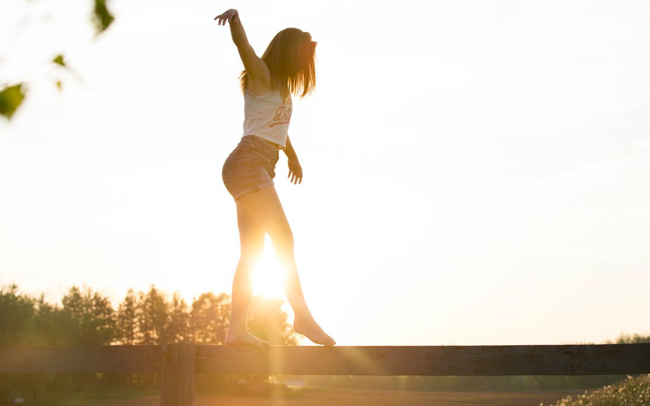 a woman balancing to express a concept related to objective reasoning