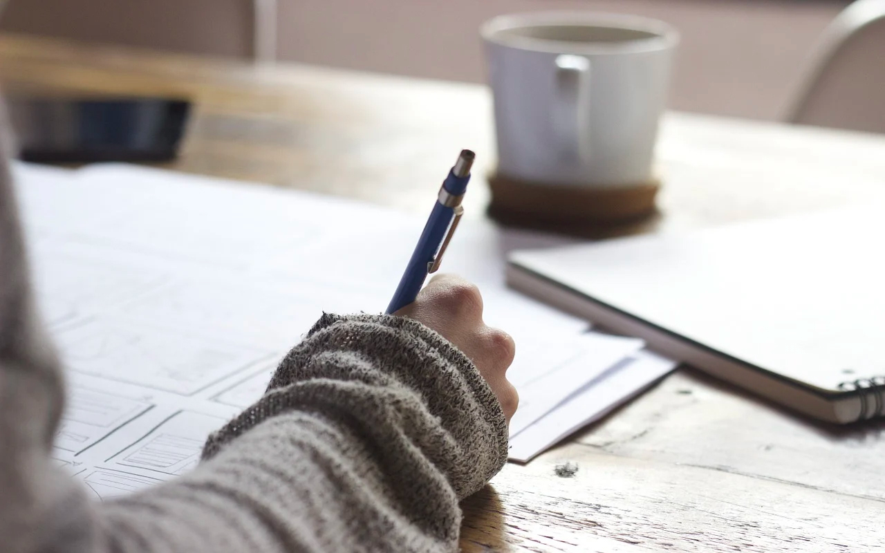 a woman writing