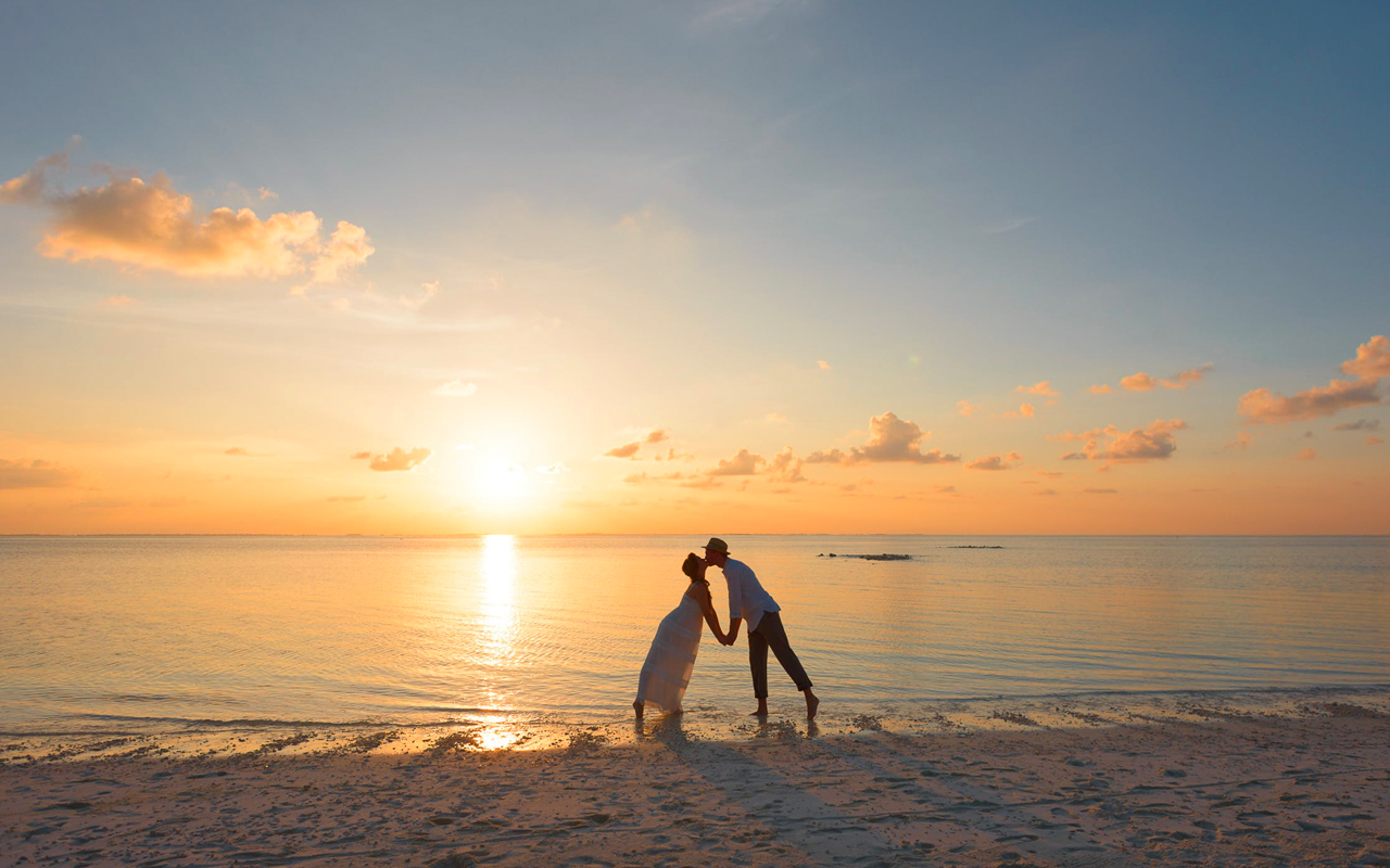 a kiss on a beach