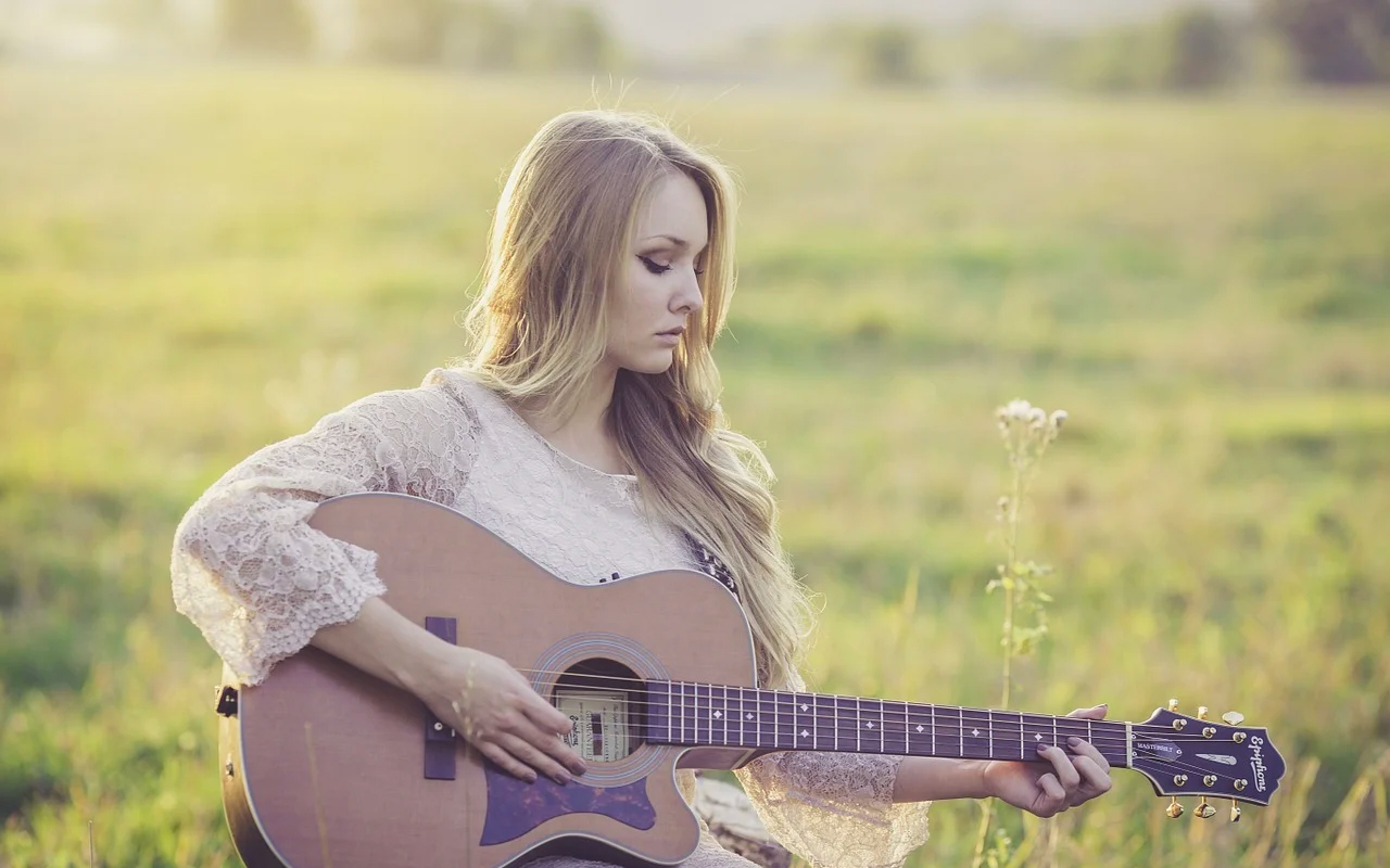 a woman is learning music