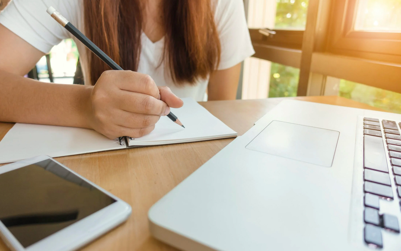 a woman focuses on study