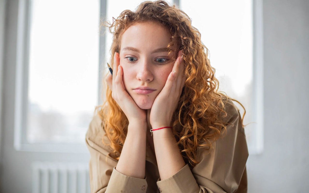 a woman is struggling with something