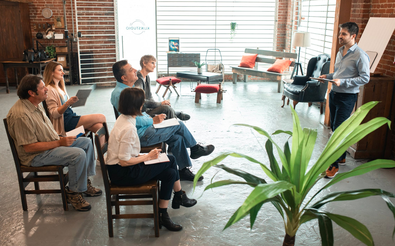 adults are learning together with a teacher