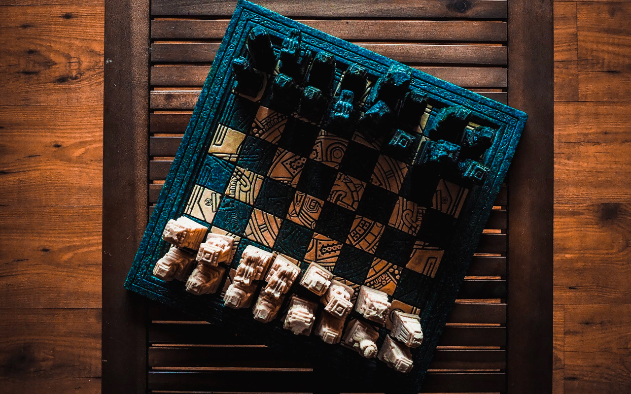 black and white chess on wood table