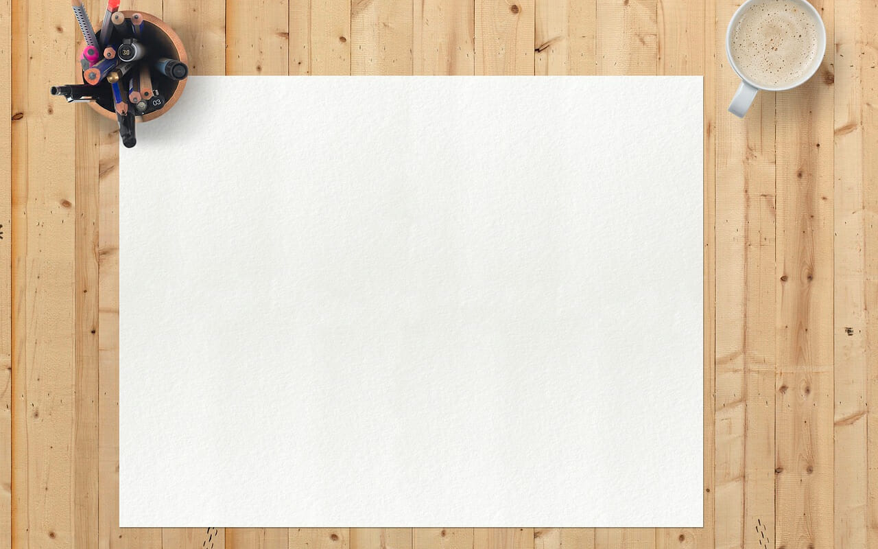 a white paper and colour pencils