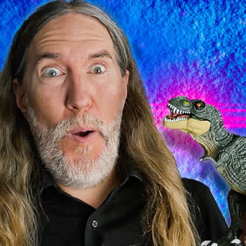 Anthony Metivier with dinosaur to express concept related to ancient memory techniques
