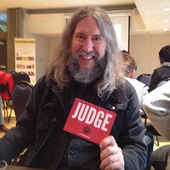 Memory Improvement tips feature image with Anthony Metivier serving as judge at a 2015 Memory Competition in Toronto