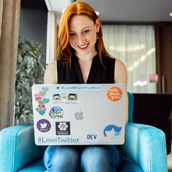 Memory Palace for programming feature image of a young smiling computer programmer with a laptop