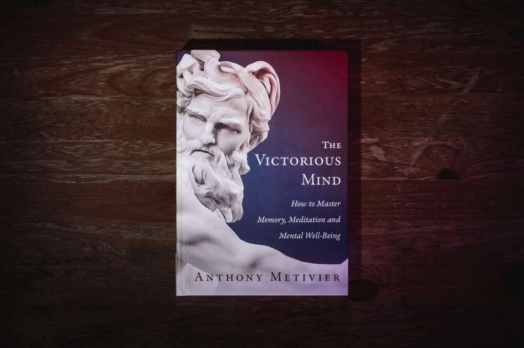 Hard cover copy of The Victorious Mind on a desk